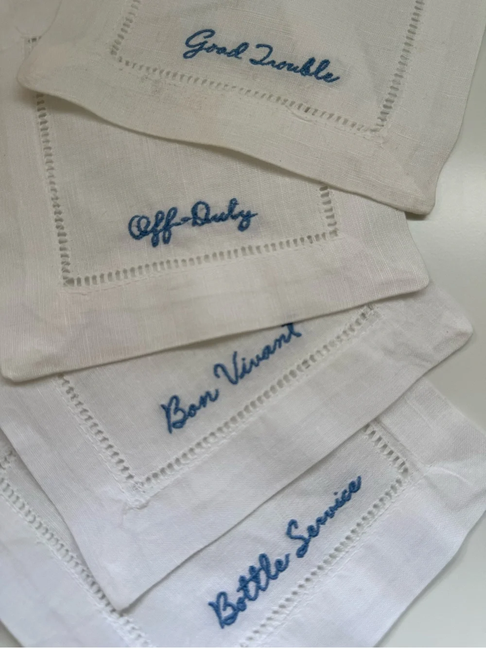 Embroidered White Linen Cocktail Napkins with Blue Script